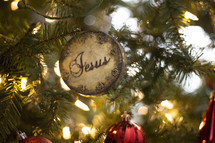 Jesus ornament on a Christmas tree 