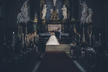 exchanging vows in a cathedral 