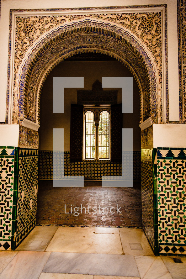 tile work on an arched doorway in Spain 