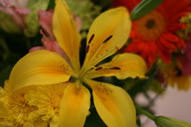 close-up of a yellow lily in a flower bouquet