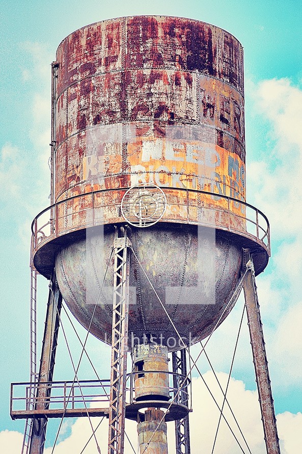 Graffiti-covered water tower.