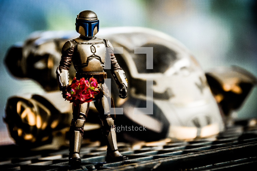 robot toy holding flowers 