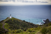 lighthouse on coastal cliff 