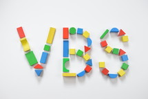 letters VBS of colorful toy wooden blocks