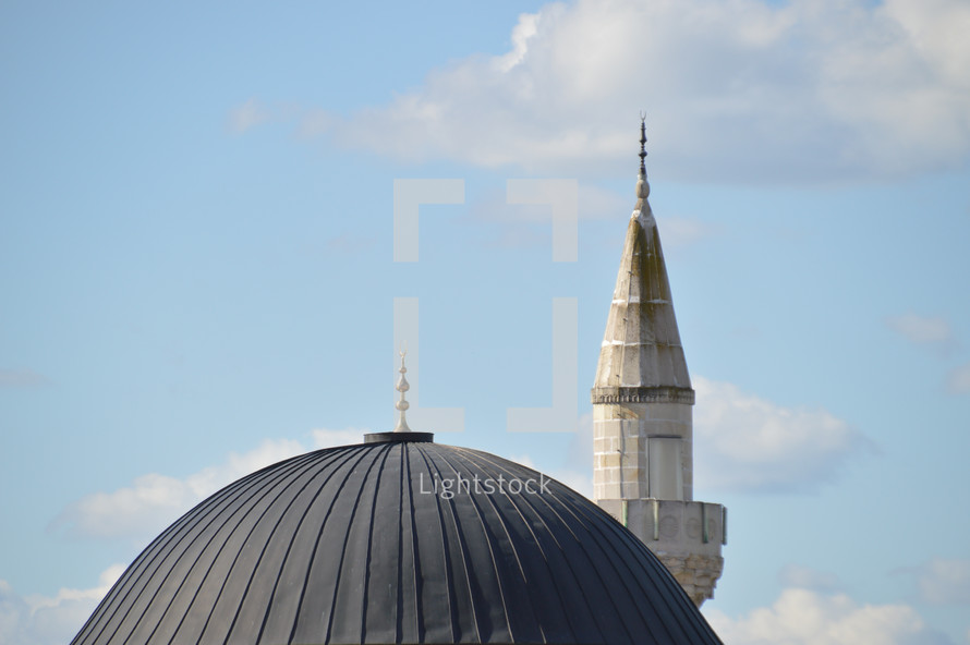 tower and dome of a mosque 