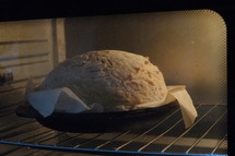 Making bread - dough cooking in the oven