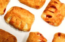 Pastries on a white surface.