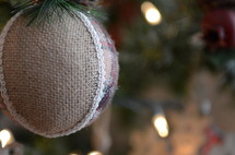 burlap and plaid ornament on a Christmas tree 