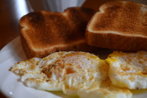 toast and eggs on a plate