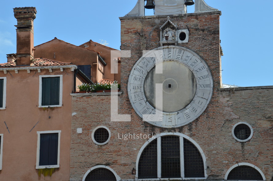 old building with ancient clock 