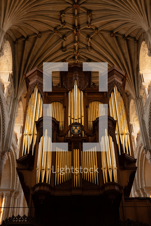 Church organ inside Norwich Cathedral, large pipe organ, beautiful religious architecture