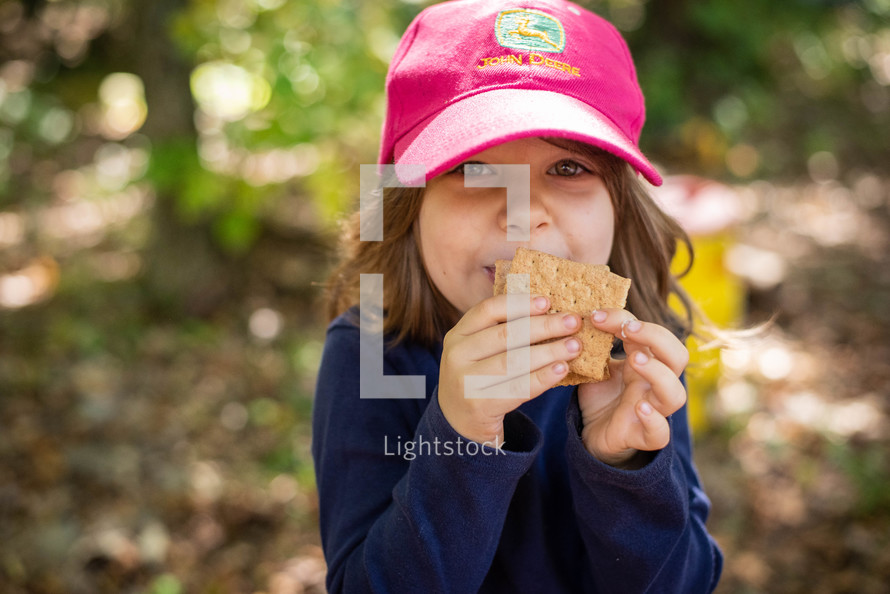 a child eating s'mores 