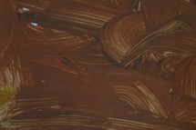 brown background with brushstrokes 