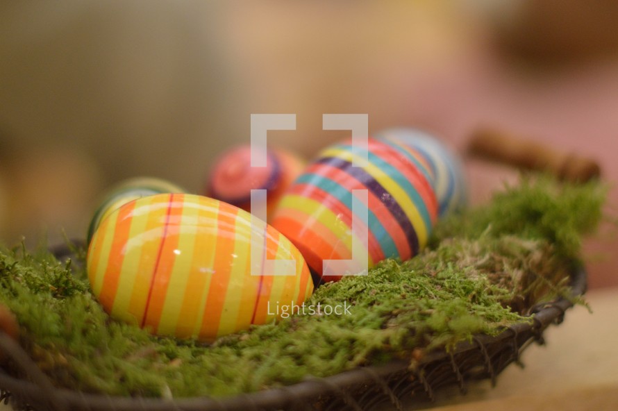 colorful Easter eggs in a basket 