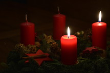 Two candles are burning at the Advent wreath for the second advent. 
