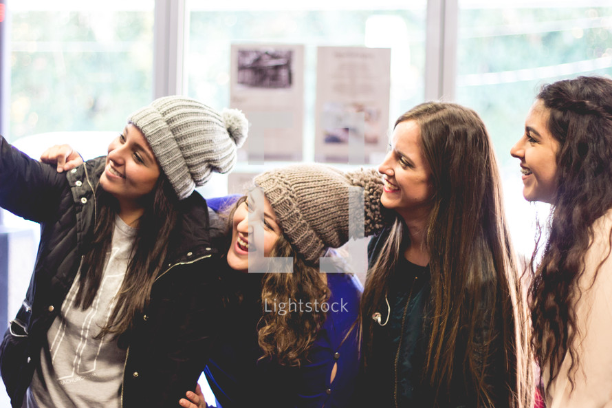 smiling teen girls in winter 