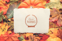 give thanks note on fall leaves 