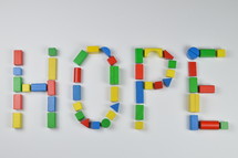 word hope of colorful toy wooden blocks