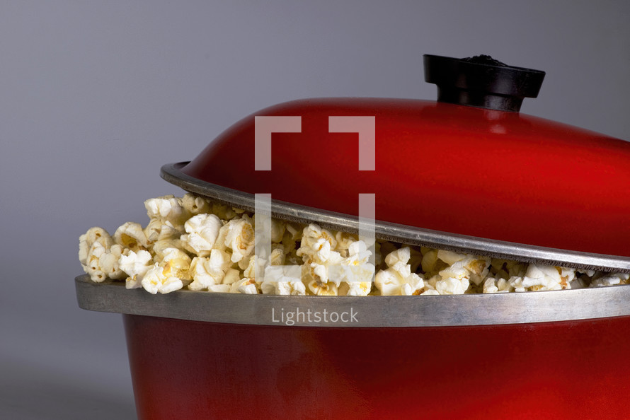 popcorn in a red pot 