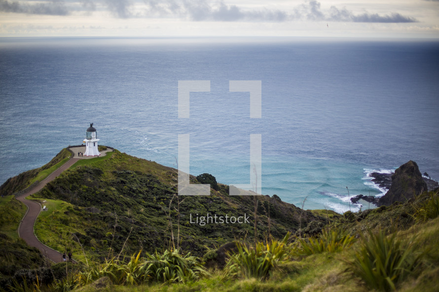 lighthouse on coastal cliff 