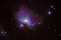 The colorful Great Nebula of Orion in outer space