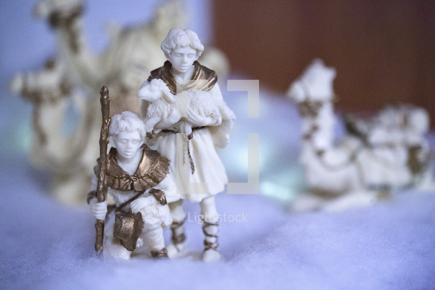 shepherd figurines from a nativity scene 