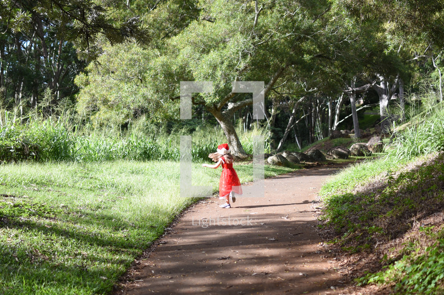 child walking on a path 
