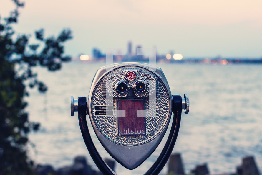 view finder scope facing a city 