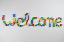 word welcome of colorful toy wooden blocks