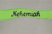 Nehemiah - torn open kraft paper over green paper with the name of the book Nehemia