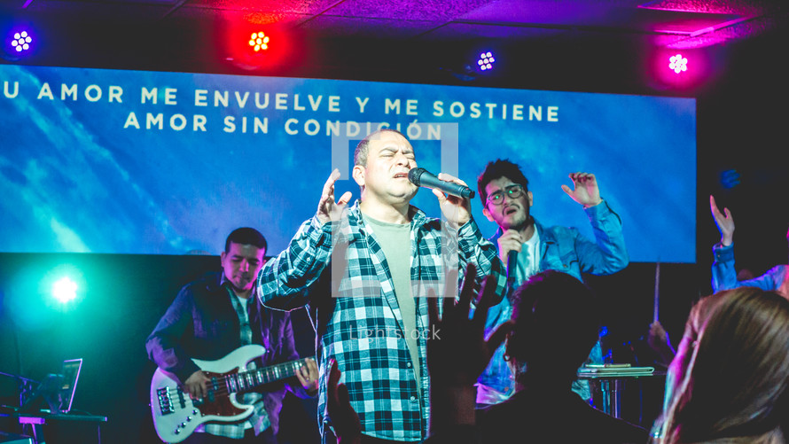 worship leaders singing during a worship service 