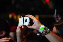 filming a concert with a cellphone 