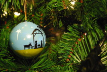 Nativity ornament on a Christmas tree 