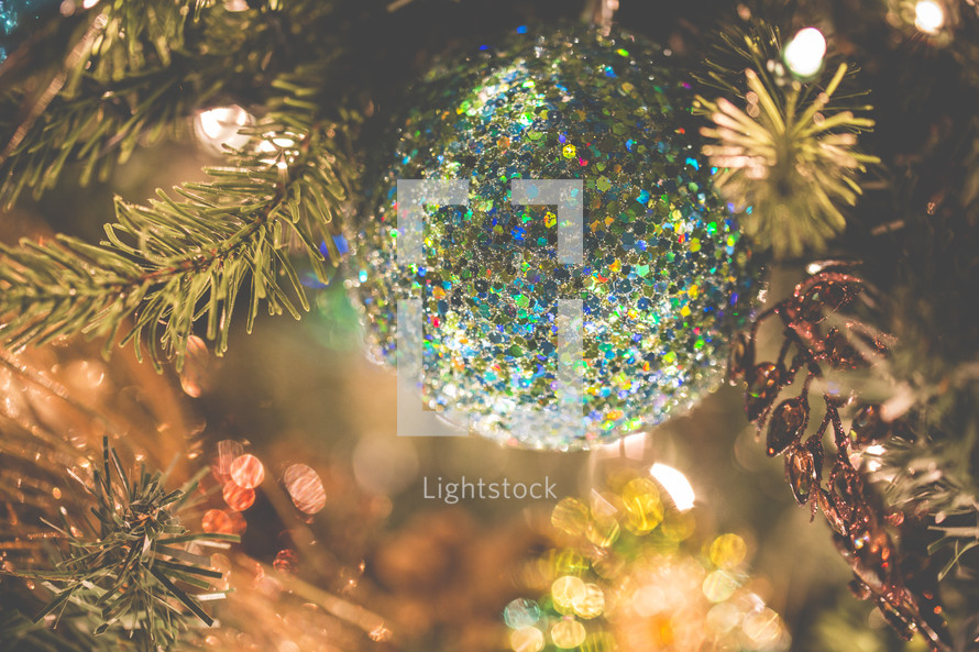 glittery ornaments on a Christmas tree