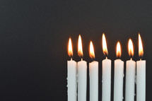 seven burning candles