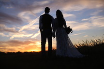 silhouette of a bride and groom 