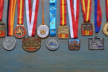 medals on cyan wooden background