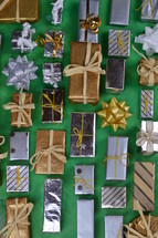 collection of wrapped Christmas gifts 