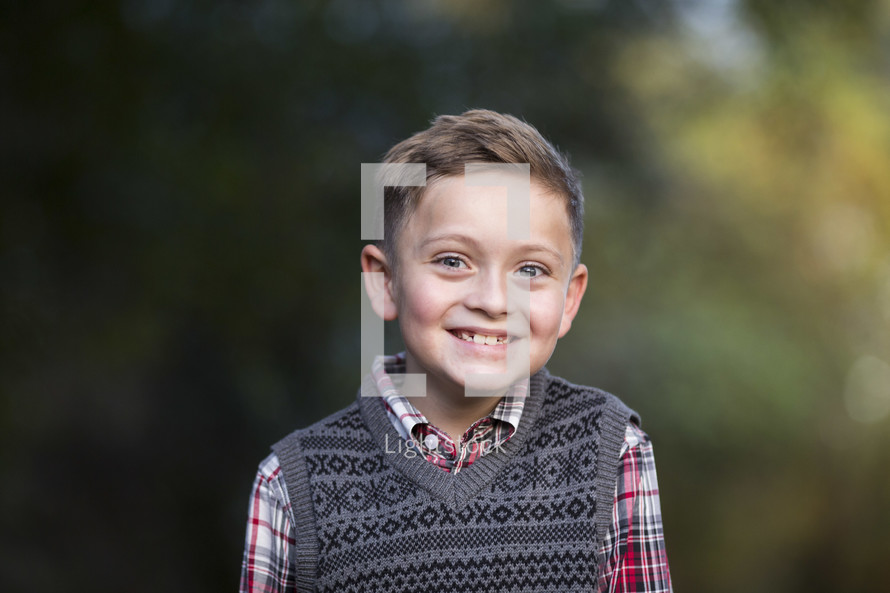 head shot of a smiling boy