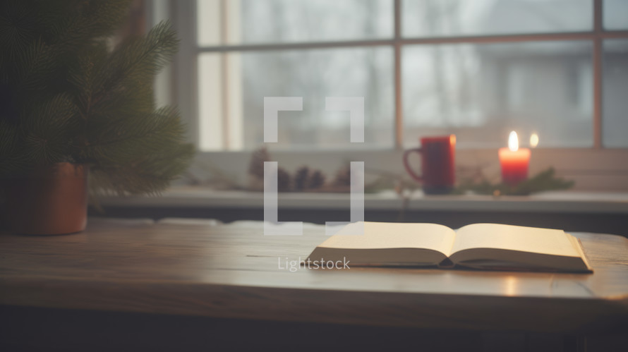 Serene Christmas Setting with Open Bible and Candle