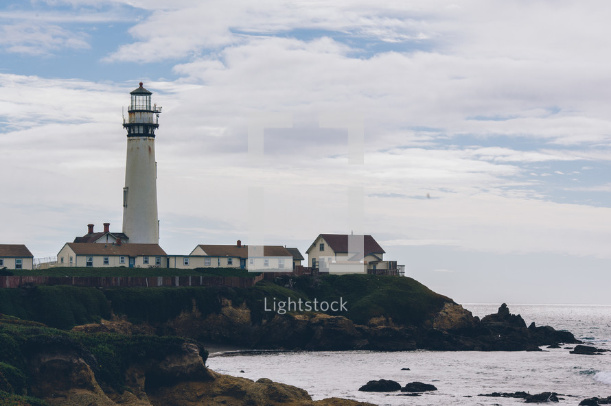 lighthouse and houses 