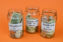 donation jars full of money 