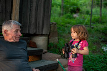 toddler girl with binoculars 