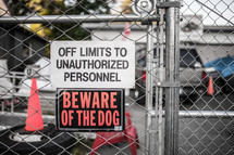 off limits to unauthorized personnel, beware of dog, sign 