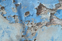 peeling paint and crumbling concrete 