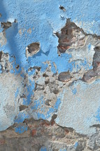 peeling paint and crumbling concrete background 