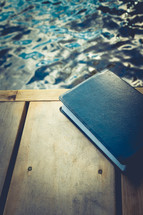 Bible on a dock 