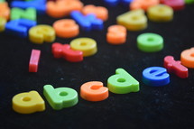 Colorful, magnetic alphabet letters.
