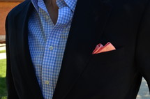 handkerchief in a suit pocket 