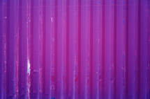 purple and pink corrugated metal background 